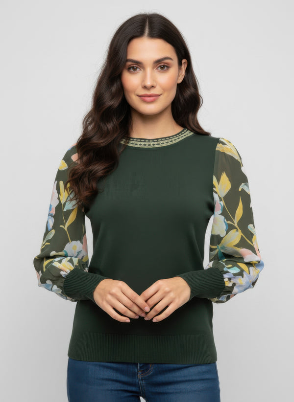 Green long sleeve top with floral print sleeves and ribbed cuffs, styled for everyday wear.