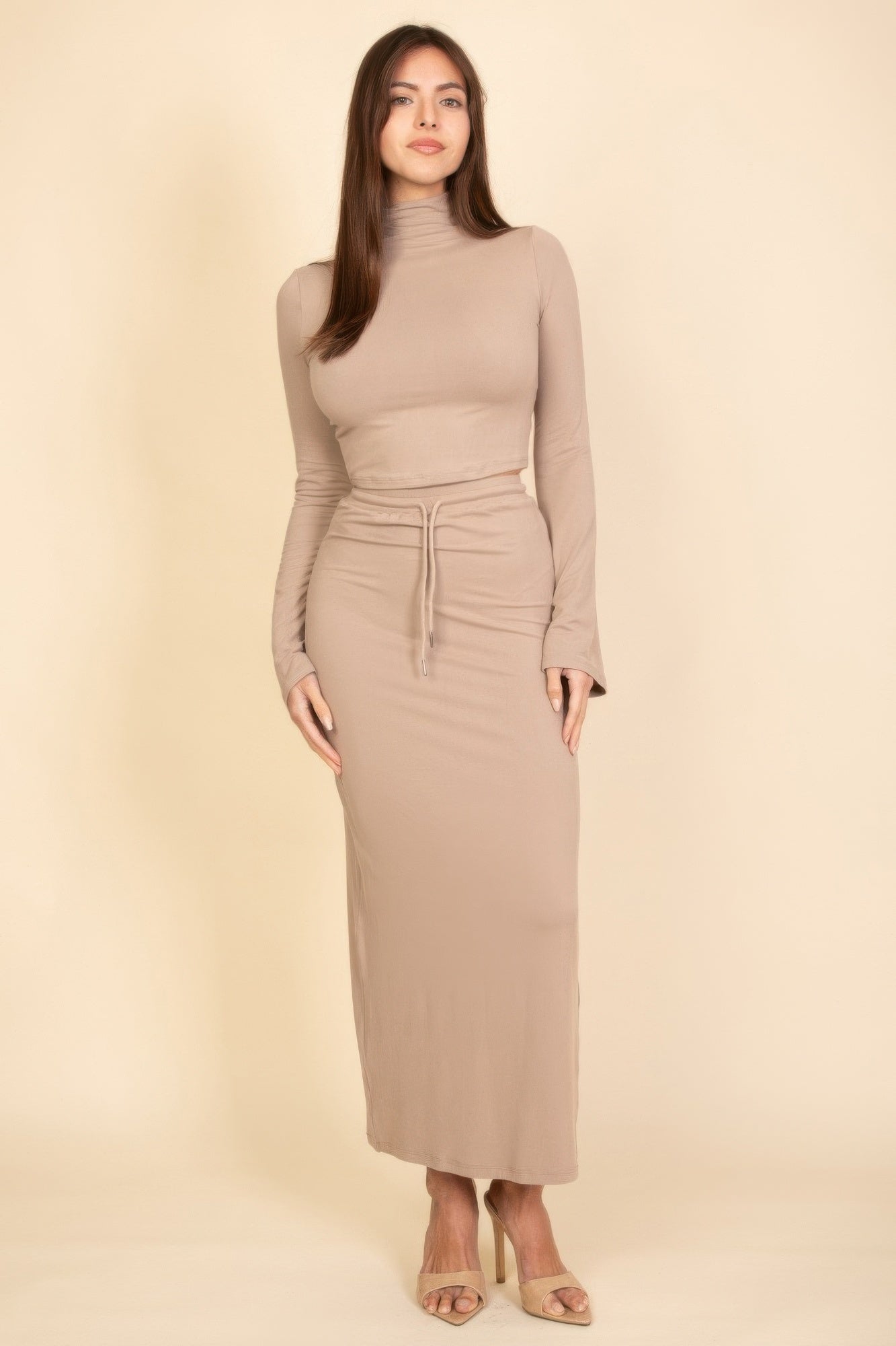 Beige long sleeve turtleneck crop top with matching midi skirt, stylish women's fashion set