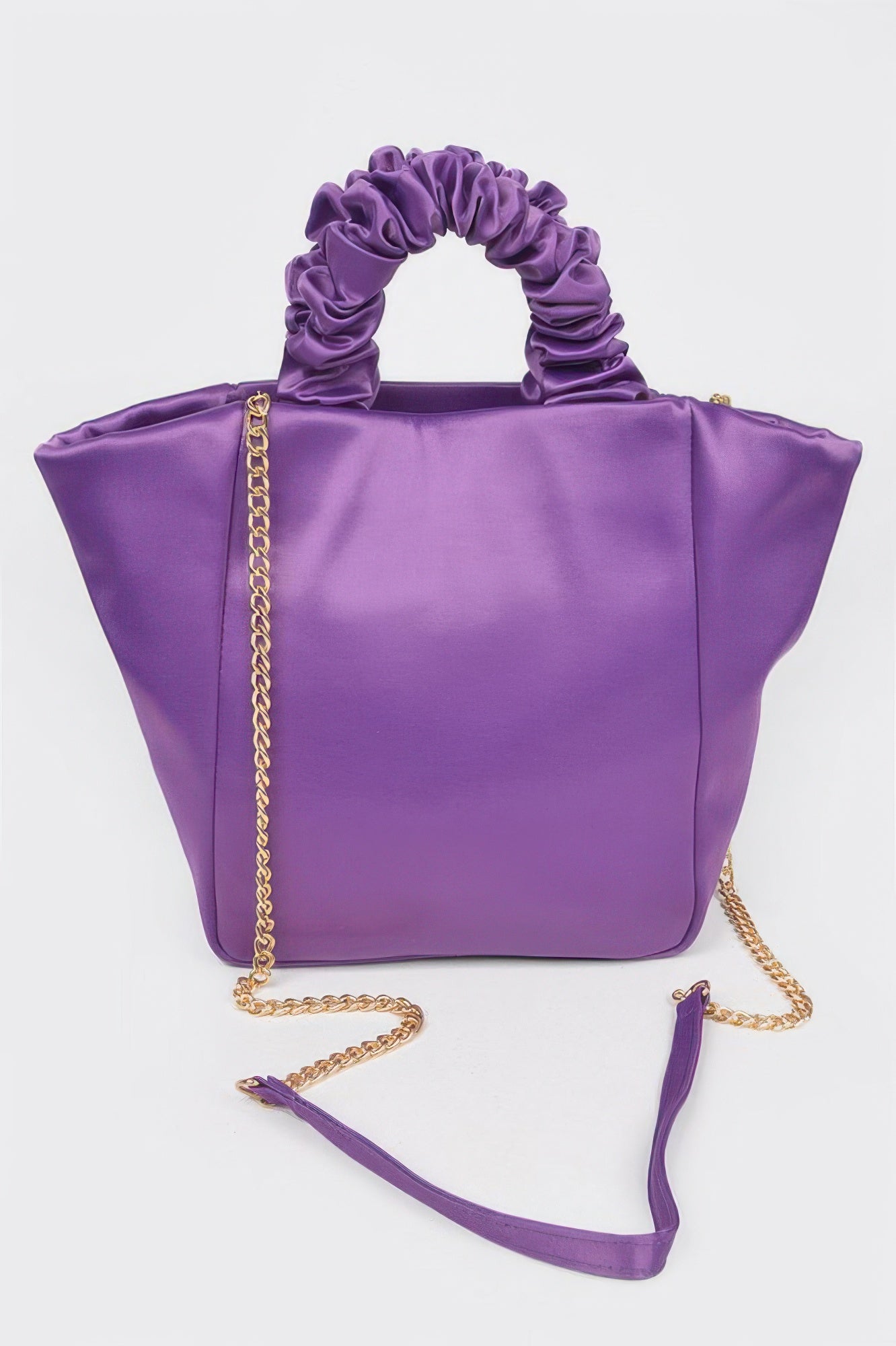 Purple satin tote bag with ruched handles and gold chain strap, chic women's fashion accessory