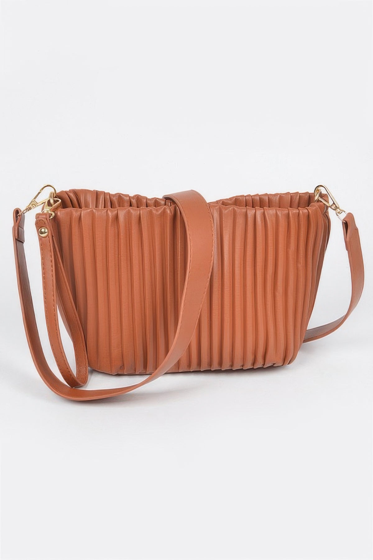 Tan pleated crossbody bag with adjustable strap and gold hardware, stylish women's accessory