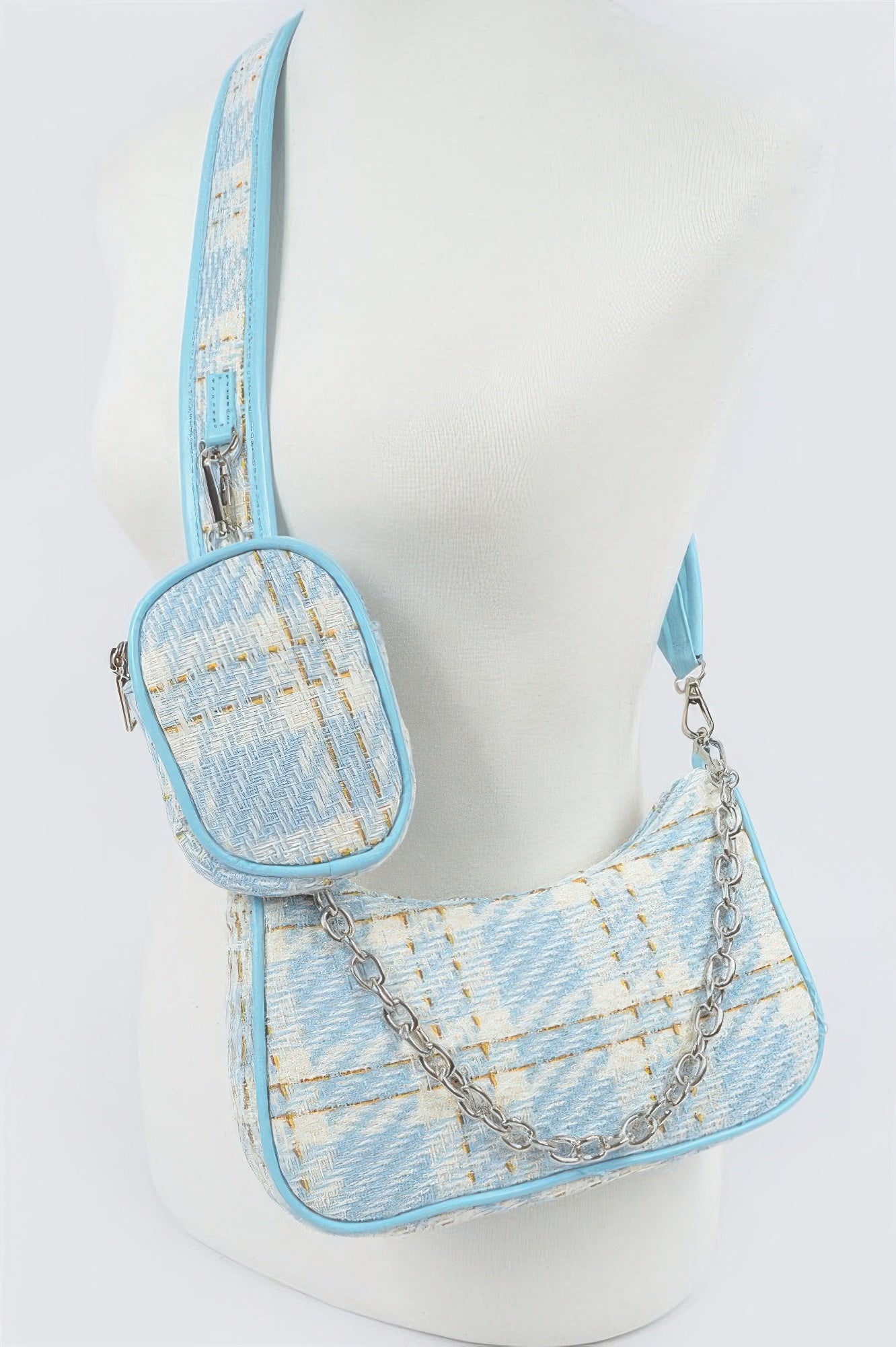 Light blue tweed crossbody bag with chain strap and matching pouch, stylish women's accessory