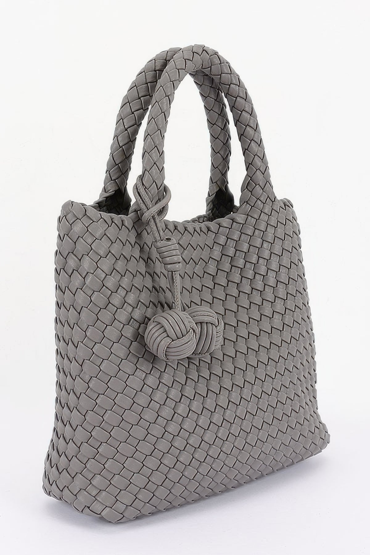 Grey woven leather tote bag with braided handles and front knot detail, stylish women's accessory